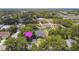 Charming single Gathering home with a well manicured lawn and mature trees at 1727 Woodpond Way, Lutz, FL 33559