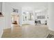 Bright foyer with tile floors leads to a dining room and living area, creating an inviting space at 1727 Woodpond Way, Lutz, FL 33559