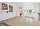 Open foyer featuring tile floors, arched doorways, with view of the front entry doors at 1727 Woodpond Way, Lutz, FL 33559