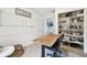 Office space featuring a desk, chair, rug, whiteboard, and bookshelf, ideal for work or study at 1727 Woodpond Way, Lutz, FL 33559