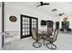 Covered patio featuring seating and dining area at 1727 Woodpond Way, Lutz, FL 33559