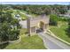 Aerial view of the community entrance, landscaping and sunny skies at 2430 Florentine Way # 46, Clearwater, FL 33763