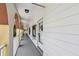 Exterior hallway with unit entrance and view to the common grounds at 2430 Florentine Way # 46, Clearwater, FL 33763