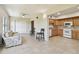 Open concept featuring tile floor, kitchen and seating area at 2430 Florentine Way # 46, Clearwater, FL 33763