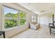 Cozy living space featuring large window and tile floor at 2430 Florentine Way # 46, Clearwater, FL 33763