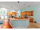 Spacious kitchen with ample counter space, wooden cabinets, and modern appliances at 2539 Centennial Falcon Dr, Valrico, FL 33596