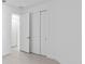 Bedroom with a closet and a view to another room at 27148 Capri Shores Cir, Englewood, FL 34223