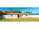 Charming single-story home featuring a well-maintained lawn and a welcoming front door at 2916 E North St, Tampa, FL 33610