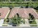 Overhead view of the home showcasing roof and landscaping at 305 Bluewater Falls Ct, Apollo Beach, FL 33572
