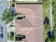 Birds-eye view of the home showing roof and driveways at 305 Bluewater Falls Ct, Apollo Beach, FL 33572