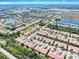 Extensive aerial shot of the residential area with lakes and manicured lawns at 305 Bluewater Falls Ct, Apollo Beach, FL 33572