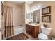 Bathroom with shower-tub combo, vanity, and neutral color scheme at 305 Bluewater Falls Ct, Apollo Beach, FL 33572