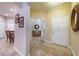 A welcoming entryway with a coat closet provides a seamless transition into the home's living spaces at 305 Bluewater Falls Ct, Apollo Beach, FL 33572