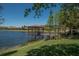 Community gazebo on the lake provides a relaxing outdoor space with beautiful scenery for residents at 305 Bluewater Falls Ct, Apollo Beach, FL 33572