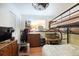 Bedroom featuring bunk beds, wood laminate flooring and ceiling fan at 3066 19Th Sw Pl, Largo, FL 33774