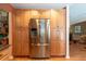 Spacious kitchen showcases stainless steel refrigerator and ample cabinet space at 3066 19Th Sw Pl, Largo, FL 33774