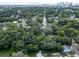Stunning aerial view of the neighborhood with lush greenery and city skyline in the distance at 3409 N 10Th St, Tampa, FL 33605