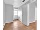 A bedroom with modern plank flooring and a window for natural light at 3409 N 10Th St, Tampa, FL 33605