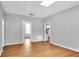 Spacious living room featuring new flooring and fresh paint at 3409 N 10Th St, Tampa, FL 33605