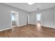 A spacious living room with multiple rooms and hardwood floors at 3409 N 10Th St, Tampa, FL 33605