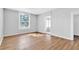 Spacious, light-filled living room with sleek hardwood floors and a welcoming, airy ambiance at 3409 N 10Th St, Tampa, FL 33605