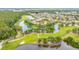 Beautiful golf course community with pristine landscaping and shimmering lakes winding throughout the property at 3503 Gaviota Dr, Sun City Center, FL 33573