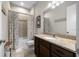 Bathroom featuring a granite countertop vanity, with bath and shower combo at 3503 Gaviota Dr, Sun City Center, FL 33573