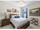 Cozy bedroom featuring neutral colors, a ceiling fan, and lots of natural light creating an inviting space at 3503 Gaviota Dr, Sun City Center, FL 33573