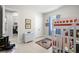 A cheerful bedroom featuring a bunk bed, playful decor, and a comfortable, inviting atmosphere at 3503 Gaviota Dr, Sun City Center, FL 33573