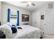 Cozy bedroom featuring neutral colors, a ceiling fan, and lots of natural light creating an inviting space at 3503 Gaviota Dr, Sun City Center, FL 33573