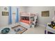 Charming bedroom with a bunk bed and natural light, perfect for  at 3503 Gaviota Dr, Sun City Center, FL 33573