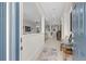 Welcoming foyer with neutral tones, tile flooring, and a view into the open-concept living spaces at 3503 Gaviota Dr, Sun City Center, FL 33573