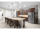 Spacious kitchen with a large center island, stainless steel appliances, and ample cabinet space at 3503 Gaviota Dr, Sun City Center, FL 33573