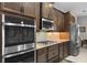 Close-up of the chef's kitchen with stainless steel appliances and sleek cabinetry at 3503 Gaviota Dr, Sun City Center, FL 33573
