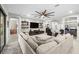 Open living area with stylish decor, comfortable seating and a large flat screen television at 3503 Gaviota Dr, Sun City Center, FL 33573