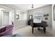 Bright room featuring a grand piano and tile flooring, creating a harmonious blend of style and functionality at 3503 Gaviota Dr, Sun City Center, FL 33573