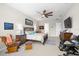 Spacious main bedroom featuring neutral colors, a ceiling fan, and lots of natural light creating a serene and inviting space at 3503 Gaviota Dr, Sun City Center, FL 33573