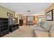 Comfortable living room with sofas, carpeted floors, and neutral wall colors at 3514 Truman Dr, Holiday, FL 34691