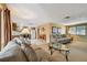 Open-concept living room and kitchen offering seamless flow and ample space for gatherings at 3514 Truman Dr, Holiday, FL 34691