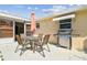 The back patio includes a dining set, grill, and access to the sunroom at 3514 Truman Dr, Holiday, FL 34691