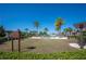 Community area with pool and palm trees at 4405 Barletta Ct, Wesley Chapel, FL 33543