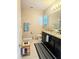 Full bathroom with dual sinks and granite countertops at 5154 Brickwood Rise Dr, Wimauma, FL 33598