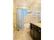 Bright bathroom with granite countertop and modern fixtures at 5154 Brickwood Rise Dr, Wimauma, FL 33598