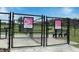 Community dog park featuring separate areas for large and small dogs with benches at 5154 Brickwood Rise Dr, Wimauma, FL 33598
