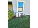 House utilities on the side of the home with green grass at 5154 Brickwood Rise Dr, Wimauma, FL 33598