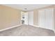 Comfortable bedroom with plush carpeting and ample closet space at 602 Stephens Rd, Ruskin, FL 33570
