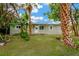 Charming home featuring a well-maintained yard, mature landscaping and inviting facade at 602 Stephens Rd, Ruskin, FL 33570