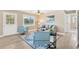 Inviting living room features modern decor, wood-look floors, and ample natural light at 602 Stephens Rd, Ruskin, FL 33570