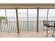 Relaxing balcony with comfortable seating and a serene water view at 6060 Shore S Blvd # 200, Gulfport, FL 33707