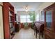 Cozy home office with tile flooring, classic roll-top desk, and built-in shelving for storage at 6060 Shore S Blvd # 200, Gulfport, FL 33707